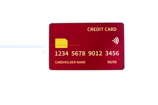Red credit card with gold lettering on a clean white background for commercial use photo