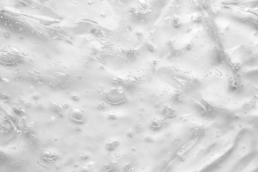 A white background with water droplets photo