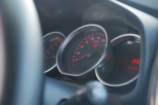 Speedometer shows vehicle speed during daylight drive photo