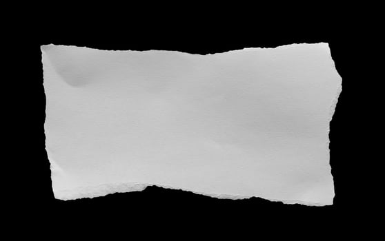 A piece of white paper on a black background photo