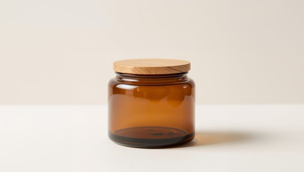 Amber Glass Jar with Wooden Lid, Decorative Container for Home Decor and Storage. photo