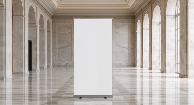 A white blank roll up banner in a large room photo