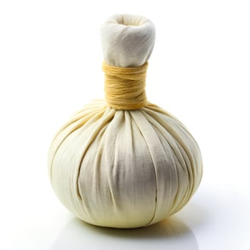 Herbal Compress Ball Spa Wellness Tool Photo on White Baackground
