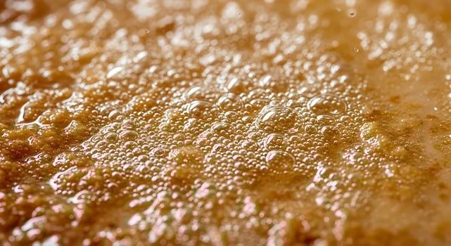 Bubbling Sauce Simmering Up Close Texture Background photo