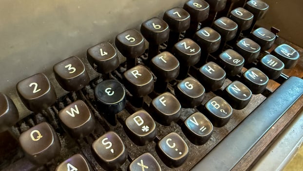 Ancient typewriter keys, whispers of ink stained stories, retro nostalgia, World Typing Day, celebrating the written words legacy photo