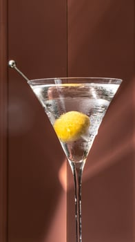Lemon twist martini sparkles under evening sun, hinting at Aperitivo Hour indulgence, World Cocktail Day revelries, elegant whispers photo