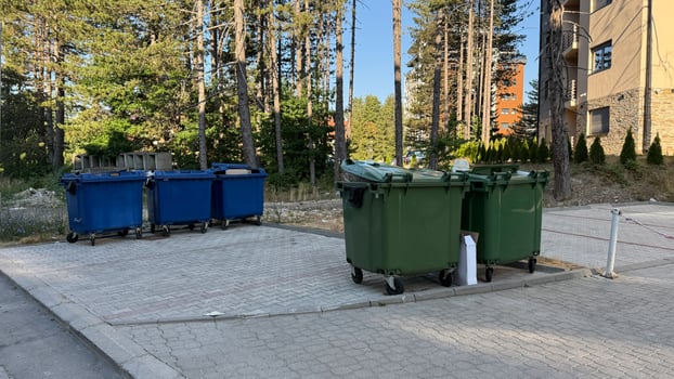 Urban recycling stations quiet choreography, tangled in the dance of Arbor Day whispers and Global Waste Reduction narrative photo