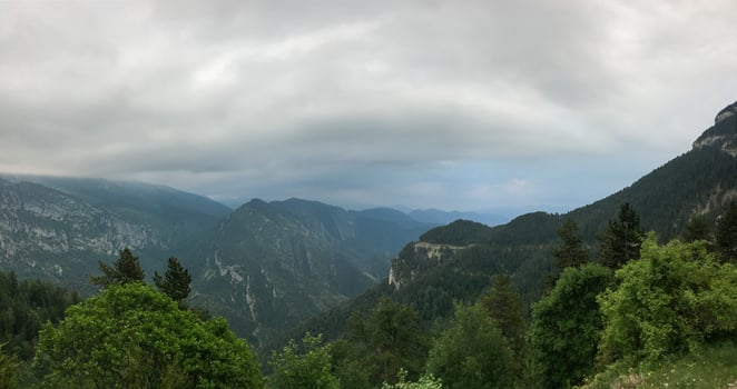 Majestic alpine vista under brooding skies evokes Earth Days call, or contemplative solstice hikes in natures embrace photo