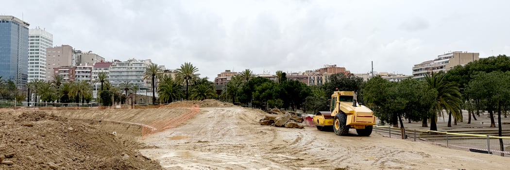 Urban renewal unfolds under a brooding sky, an emblematic dance of progress for Earth Day celebrations in Mediterranean hues photo
