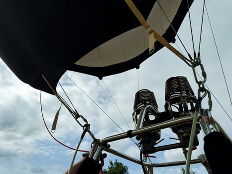 Hot air balloon burners against cloudy sky on a scenic day photo