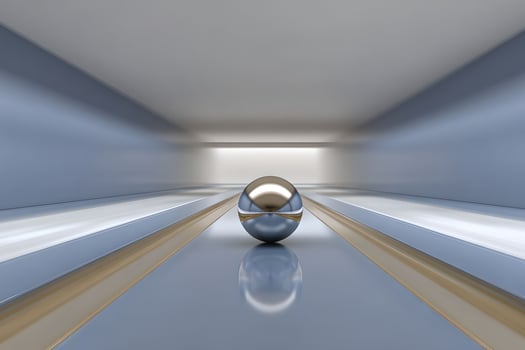 A ball is sitting on a bowling lane photo