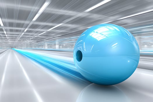 A blue ball is moving through a tunnel photo