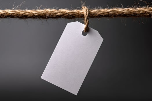 Blank tag hanging on rope photo