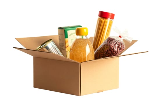 Cardboard box filled with various grocery items and pantry staples photo