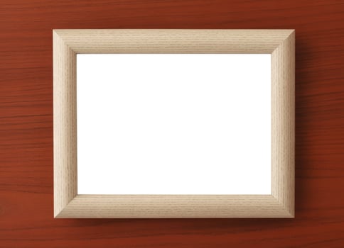 Minimalist light wood picture frame centered on a rich wooden surface photo