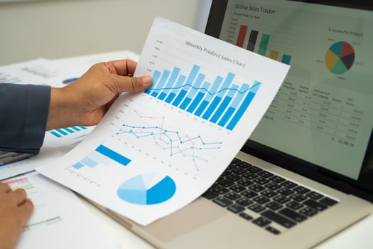 Asian business woman working graph. photo