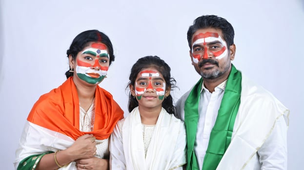 A family with painted faces of indian flag photo