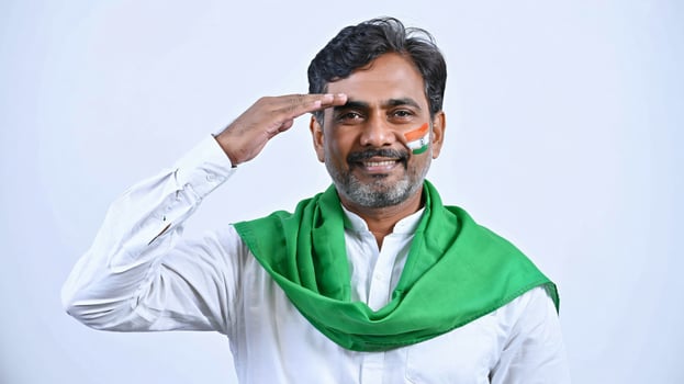 A man in a white shirt and green scarf saluting photo