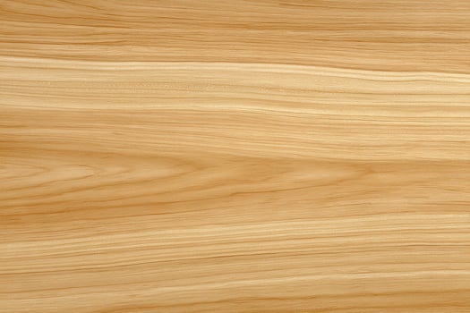 Closeup of polished beech wood featuring warm creamy tones and detailed natural wood grain texture photo