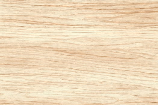 Closeup of maple wood texture featuring pale beige tones and detailed natural wooden patterns photo