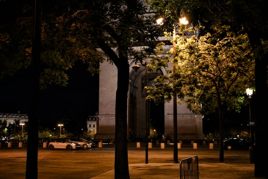 Arc de Triomphe night view with trees Paris France photo