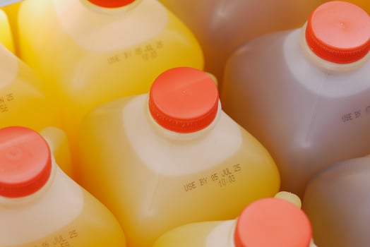 Expire date on Colorful juice bottles in a grocery store photo