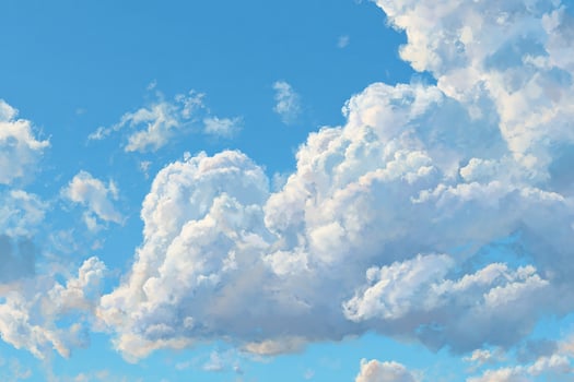 Realistic blue daytime sky scene with delicate white clouds floating in the warm sunlight above photo