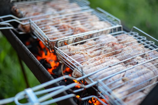 homemade grill for roasting chicken on a summer evening photo