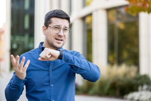 Man talking about time management outdoors photo
