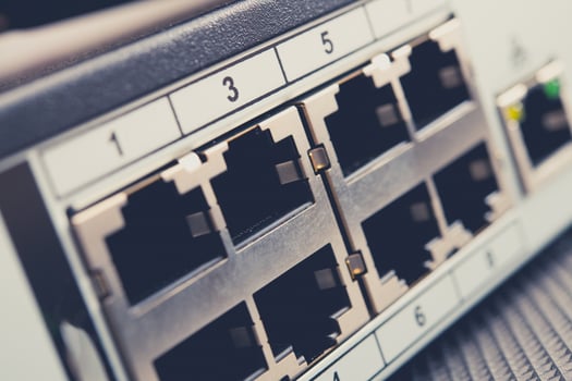 Network Switch With Multiple Ports for Wired Connections in a Modern Setting photo