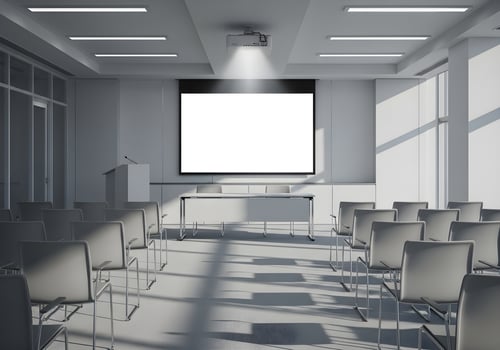 Clean and modern empty office presentation room with projector light on blank screen, captured in ultra-detailed natural lighting with no human elements photo