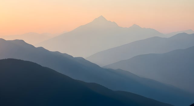 Abstract minimalist mountain layers fading into mist under warm and cool blended sunlight, ultra-detailed, crisp edges, noise-free, natural lighting, serene view photo