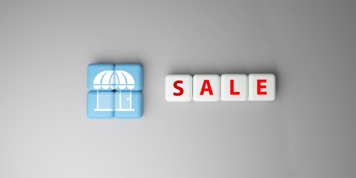 3D render of two cubes with store icon and four cubes spelling SALE on gray background, symbolizing online marketing, ecommerce promotion, retail discounts, and business sales strategy. photo