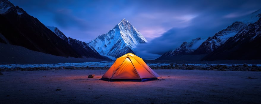 Illuminated tent mountain vista night camping photo
