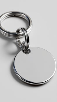 Blank metal keyring, studio shot, white background, mockup photo