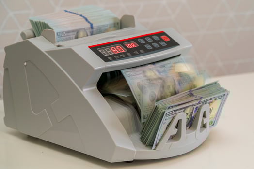 Money Counting Machine in Action at a Financial Office photo