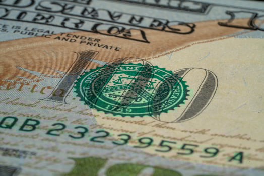 Close-up View of a Ten Dollar Bill Highlighting Intricate Details photo