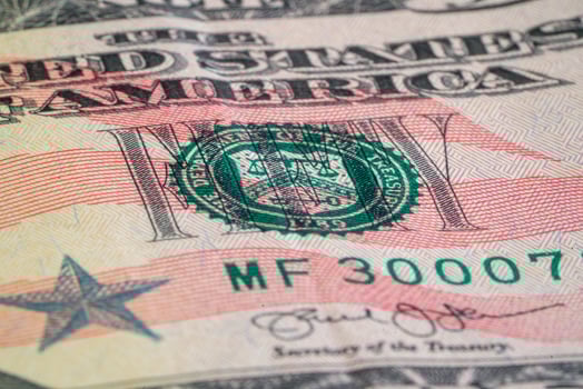 Detailed View of US Currency Showcasing Treasury Seal and Signatures photo