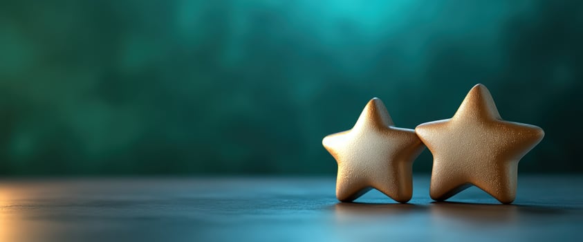 Two stars on teal background, rating concept photo
