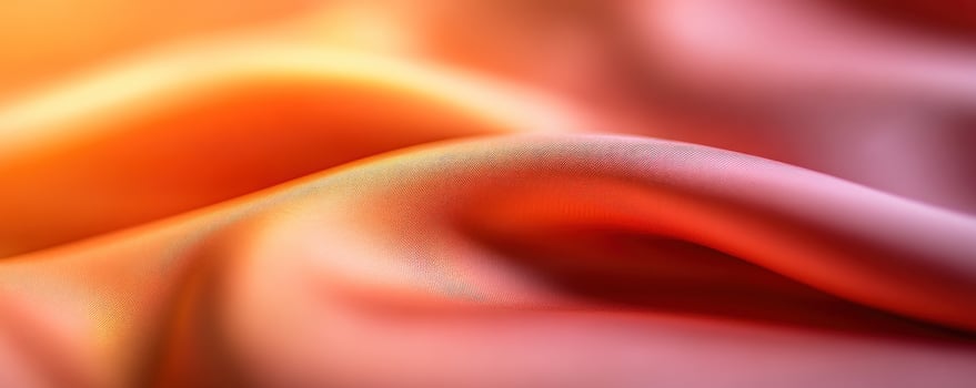 Abstract orange fabric texture, soft folds, studio shot, blurred background, design element photo