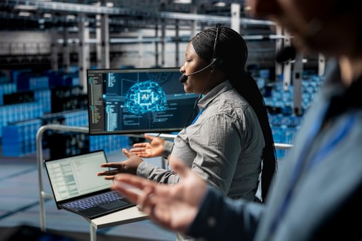 Data center admin using headset mic interpreting logs to resolve user issues. Technician identifying hardware issues using predictive AI alerts, guiding users photo