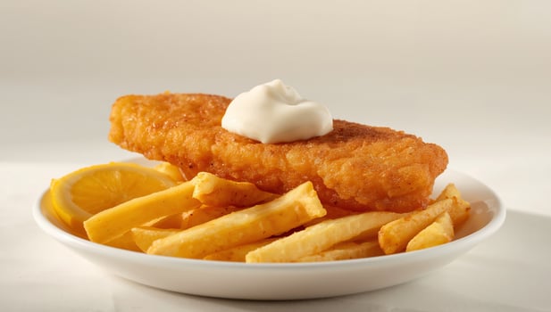 Fish and Chips with Lemon and Mayonnaise, a Classic and Delicious Meal. photo