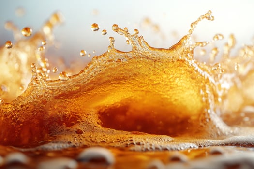 A close up of a liquid being splashed into the air photo