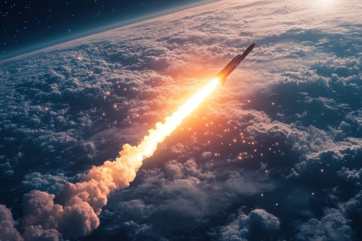 A rocket is flying through the sky photo