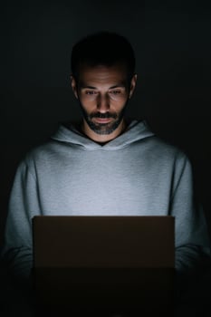 Mysterious male figure in dim light, Middle Eastern descent, encapsulates occult tech vibes, captivating during International Dark Sky Week photo