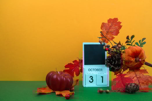Autumn concept on yellow background for Halloween holiday photo