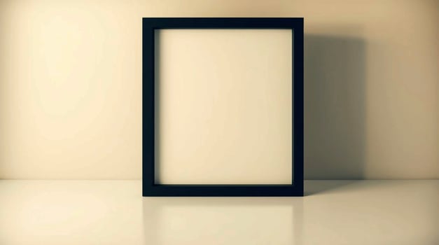 A black frame sitting on a white surface photo