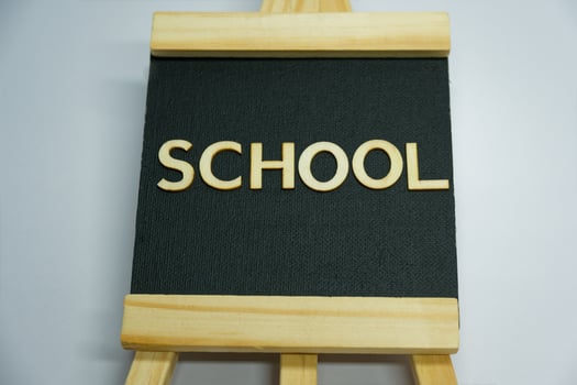 Stylish SCHOOL Sign on Fabric Display Board for Educational Themes photo
