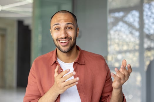 Man smiling in modern office photo