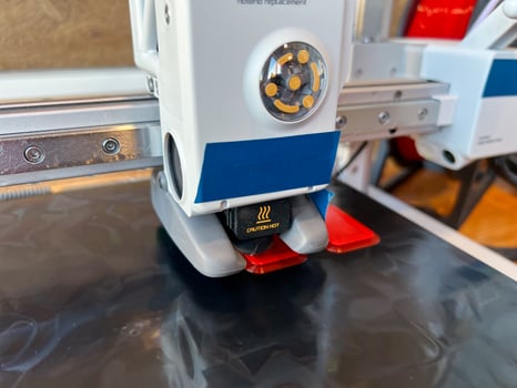 3d printer creating object on platform photo
